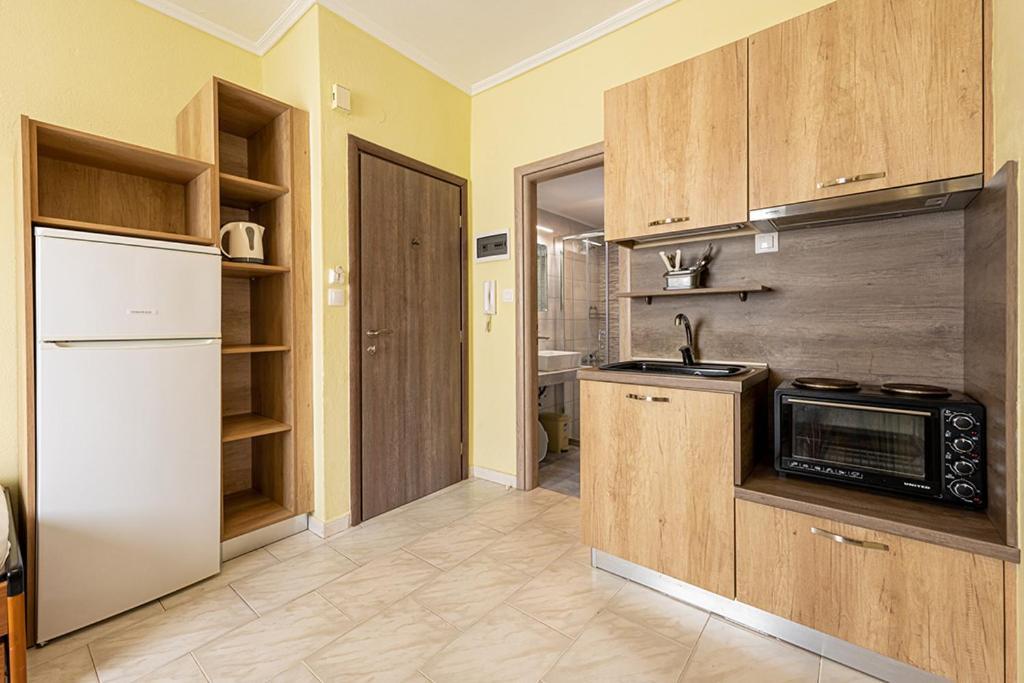 Dionisos Apartments Паралия Дионисиу Стая снимка